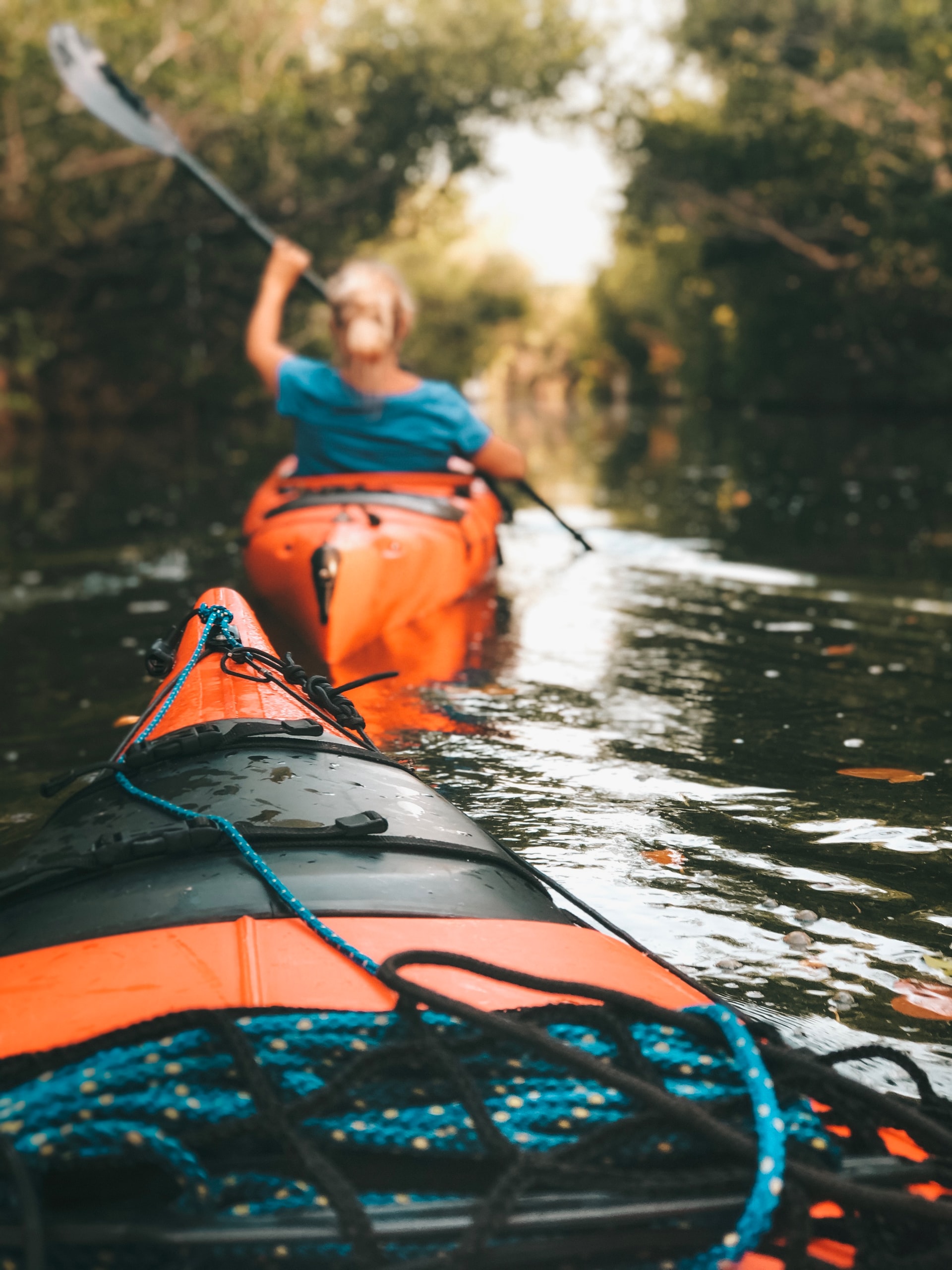 Women Kayaking in Retirement, Exploring.